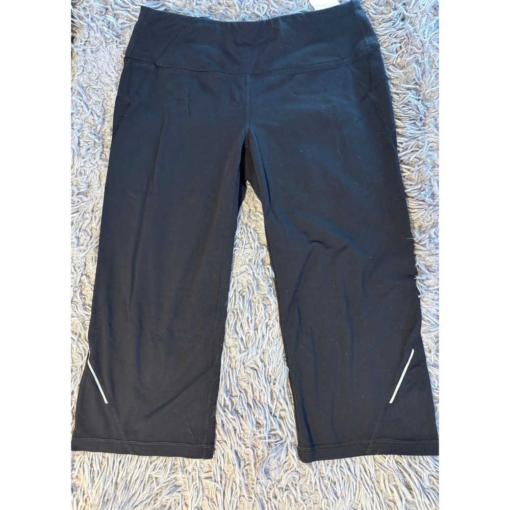 Athleta Black Cropped Yoga Pants Capris Reflective Zipper Pocket Womens Size M